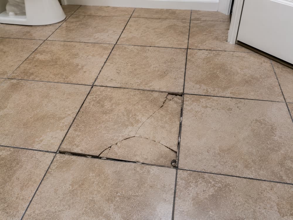 Cracked tile & grout repair — before